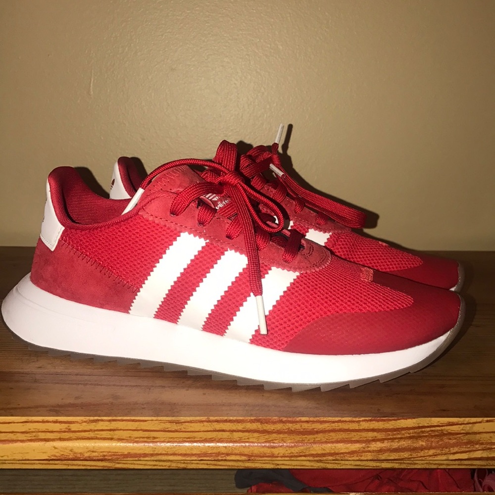 Women's red adidas nmd